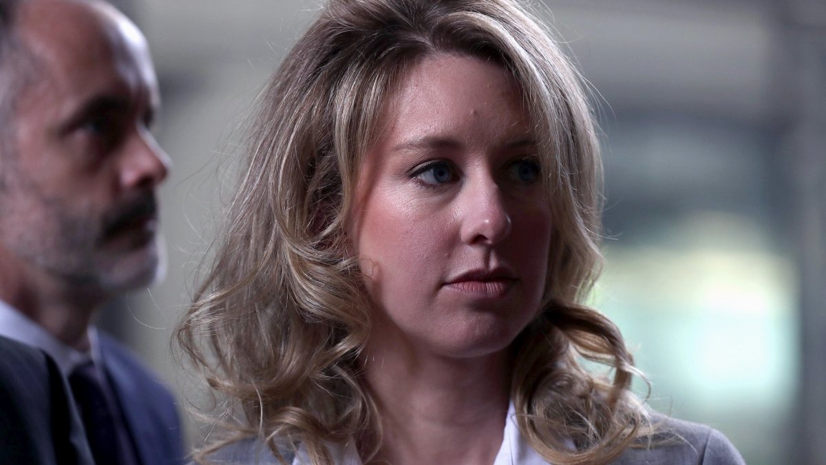 Pretend you’re sitting at Elizabeth Holmes’ desk on this weirdly detailed website